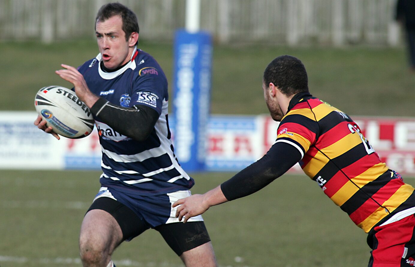 2010 - Dewsbury v Featherstone - Featherstone Tom Saxton evades Ayden Faal